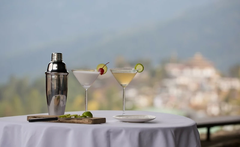 Modern delights paired with spectacular views of a 17th-century monastery. 

Take your pick of our signature drinks:
Left: Sweet Vanilla Mocktail served with cherry & lime
Right: Classic Margarita with salt rim & lime

#gangteylodge #cocktails #drinksmenu #drinkswithaview #gangteymonastery #bhutan #luxuryretreat #luxurylodge #undiscoveredbhutan #authenticluxury